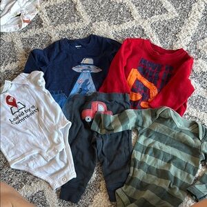 Various Carter's tops, onesies and pants